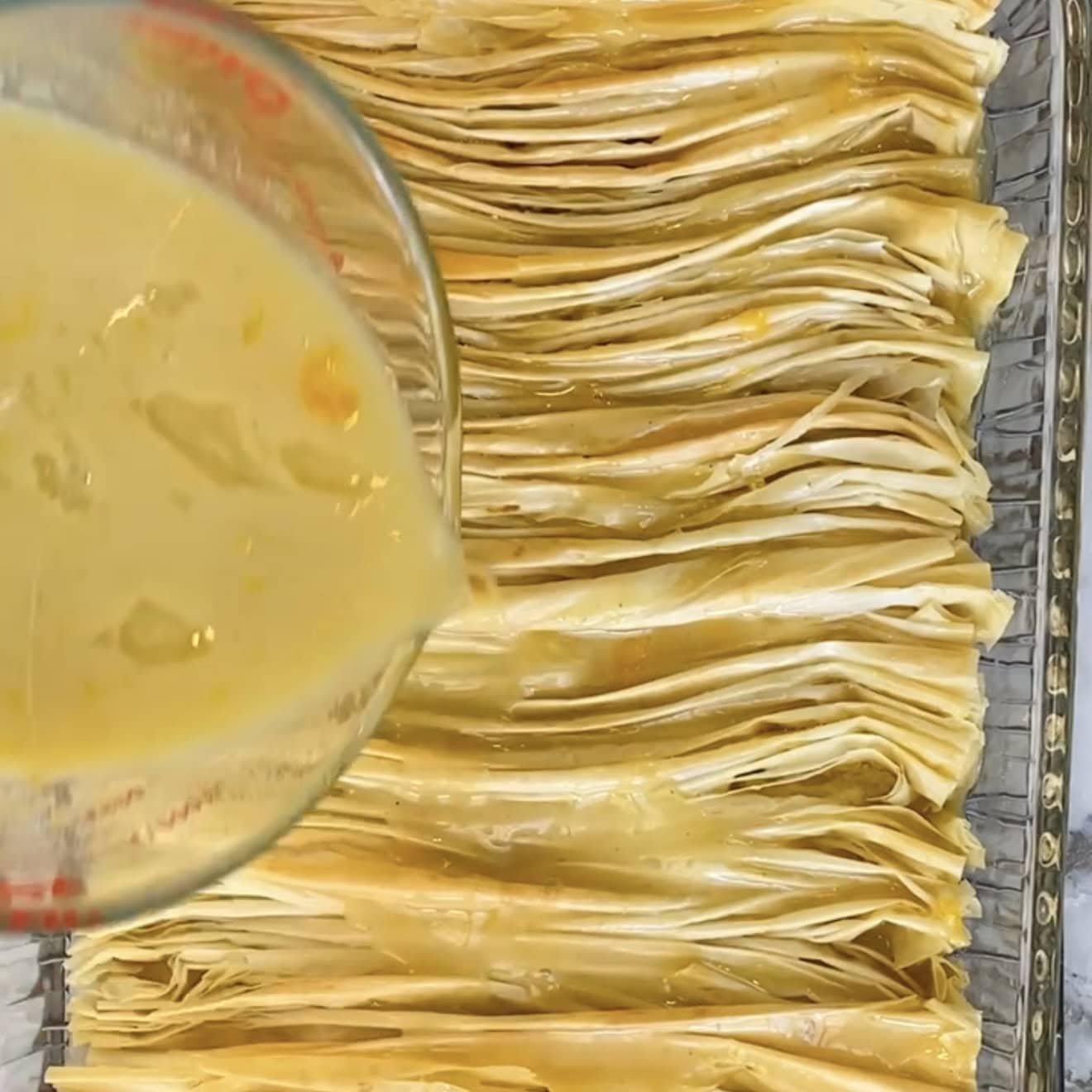 adding custard to the baked phyllo 