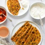 methi thepla served with yogurt and pickle
