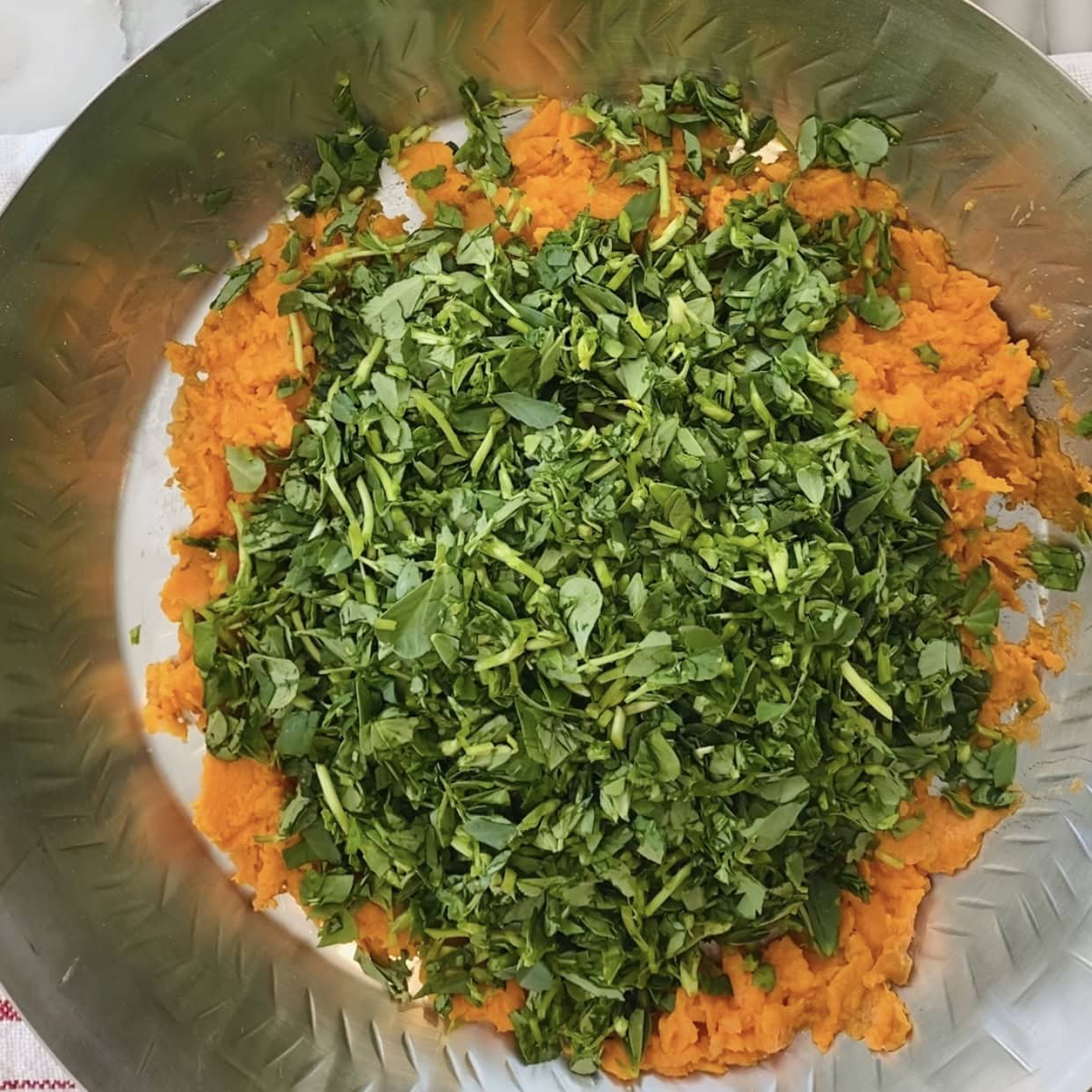 fresh chopped methi added to mashed sweet potatoes.