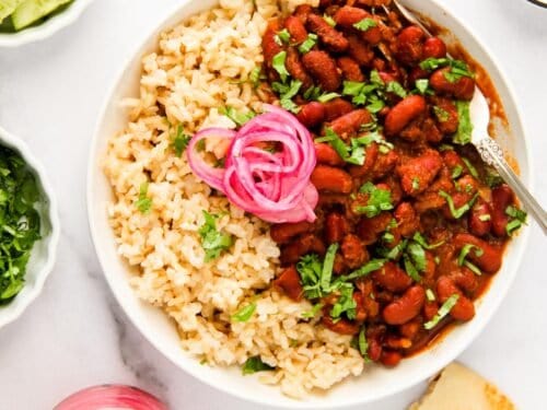 Rajma curry served with brown rice and pickled onions