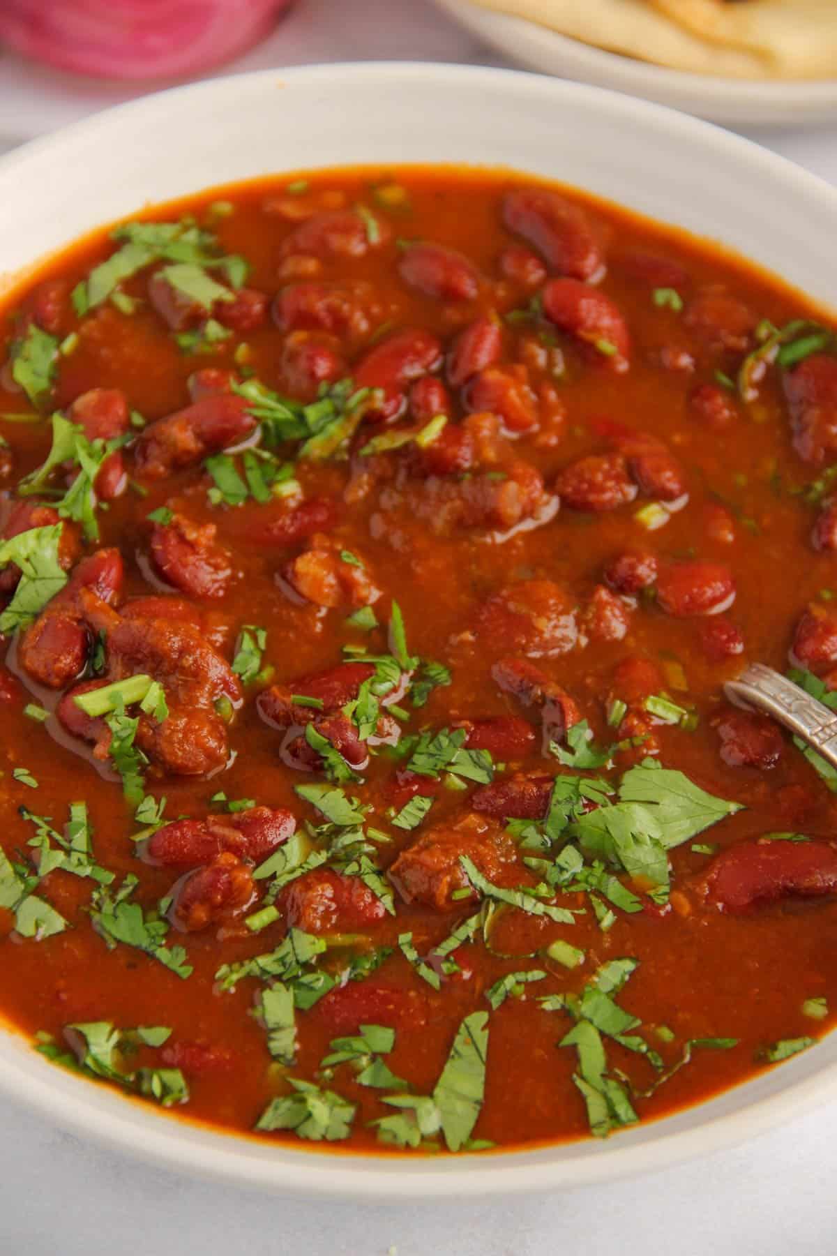 rajma masala garnished with cilantro 