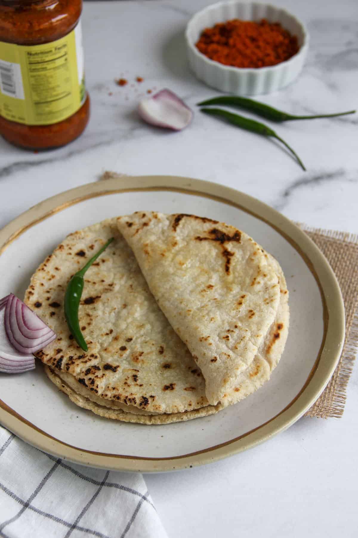 Jowar Rotis with chili and onions
