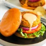 veggie chana burger served with sriracha mayo