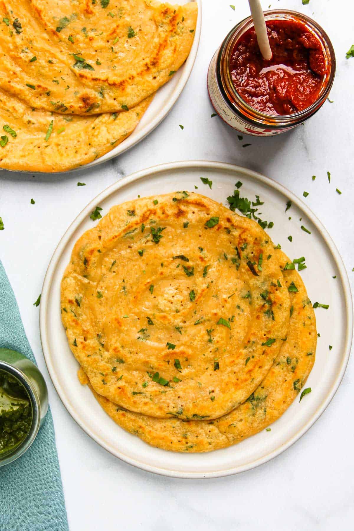 Masoor Dal Chilla garnished with cilantro 