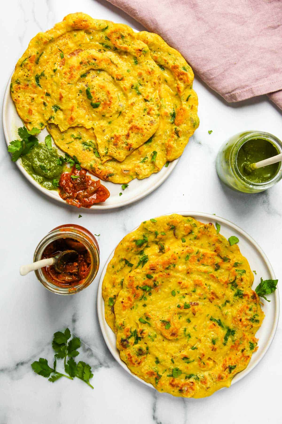 Moong Dal Pudla served with chutney and pickle 