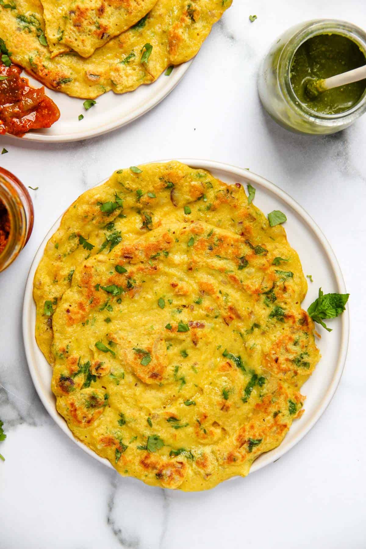 Mung Dal Chilla served in a white plate 