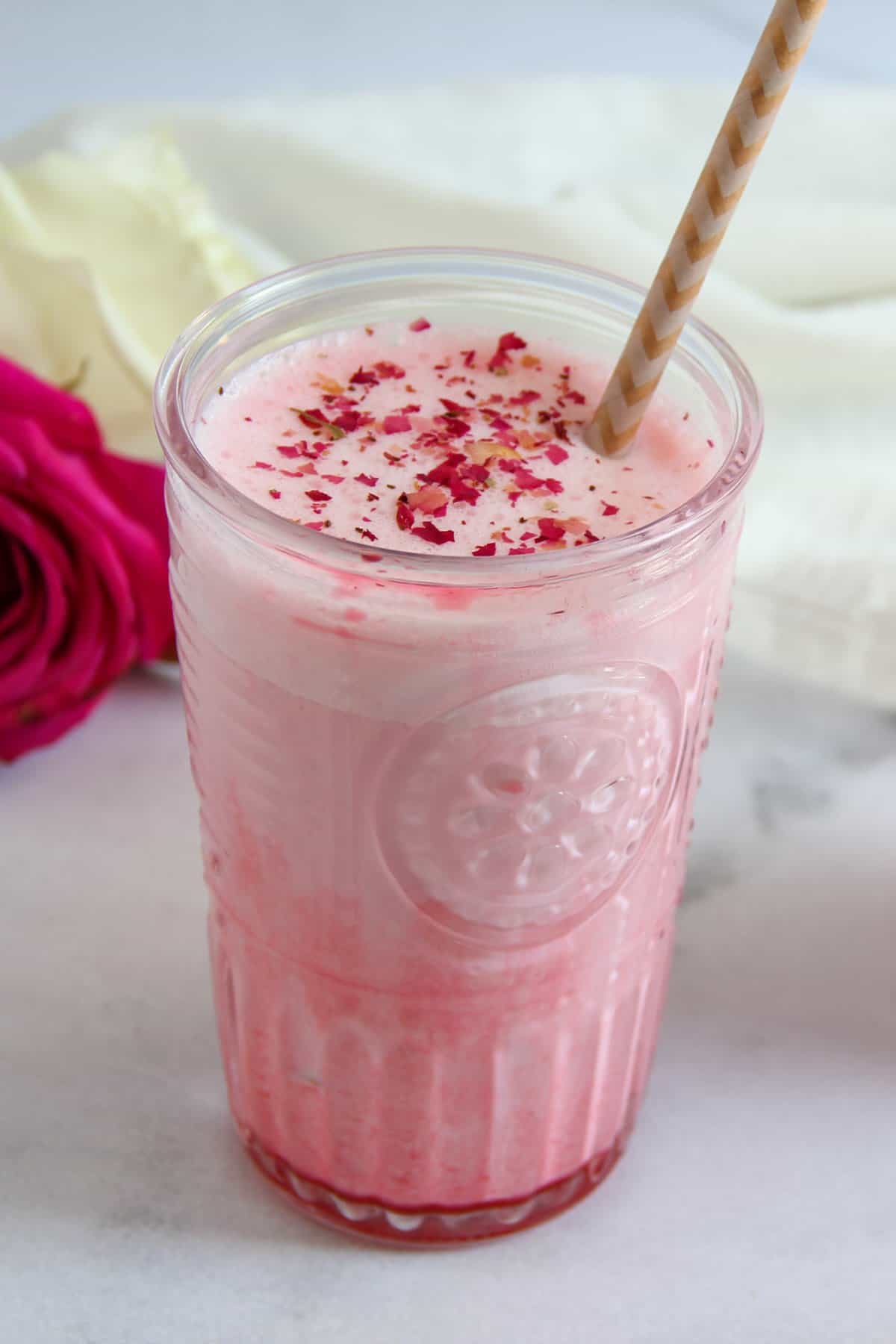 Rose lassi garnished with rose petals