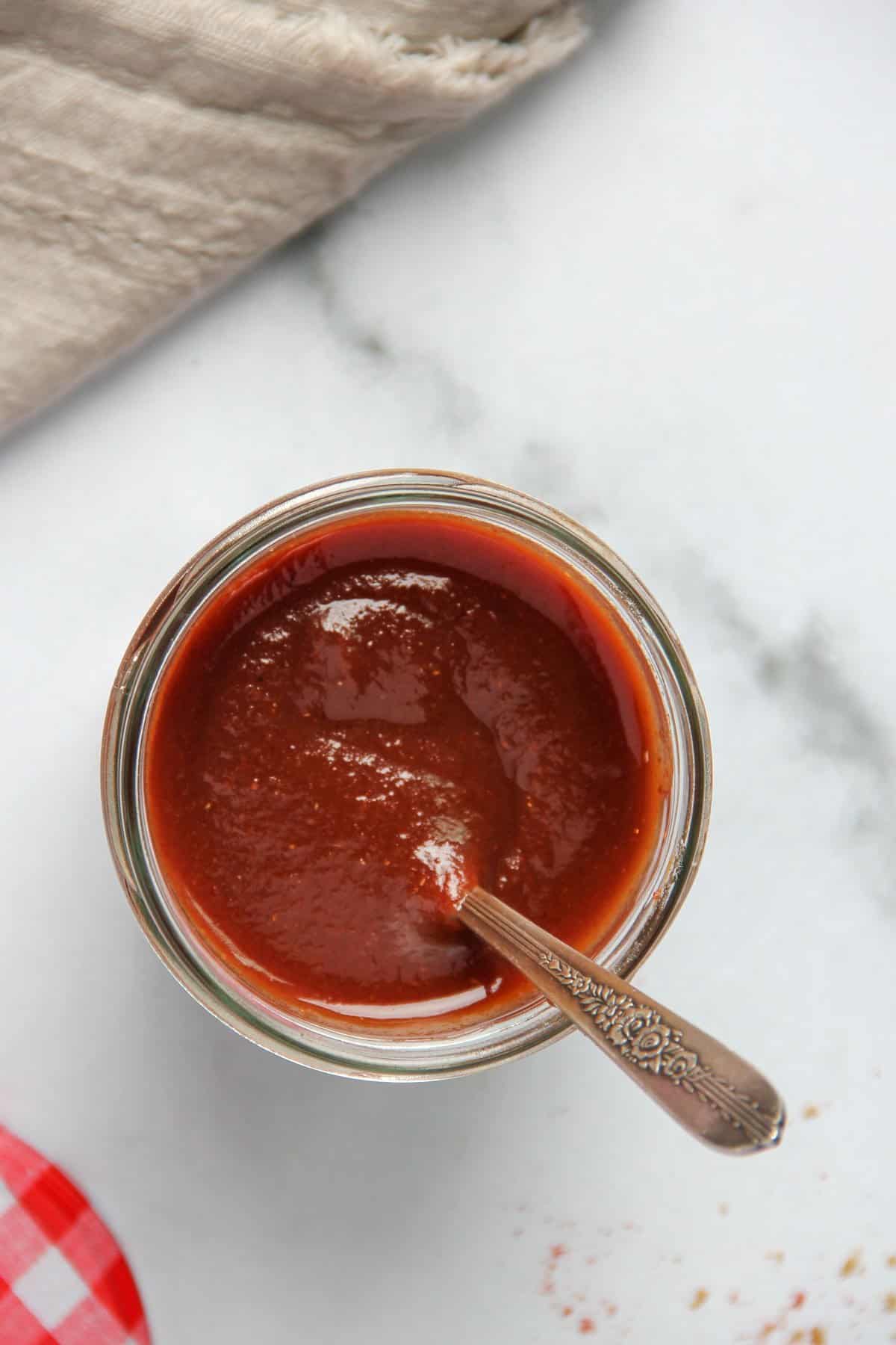 Tamarind chutney in a glass jar 