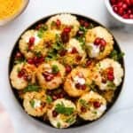 Dahi Sev Puri served in a black plate