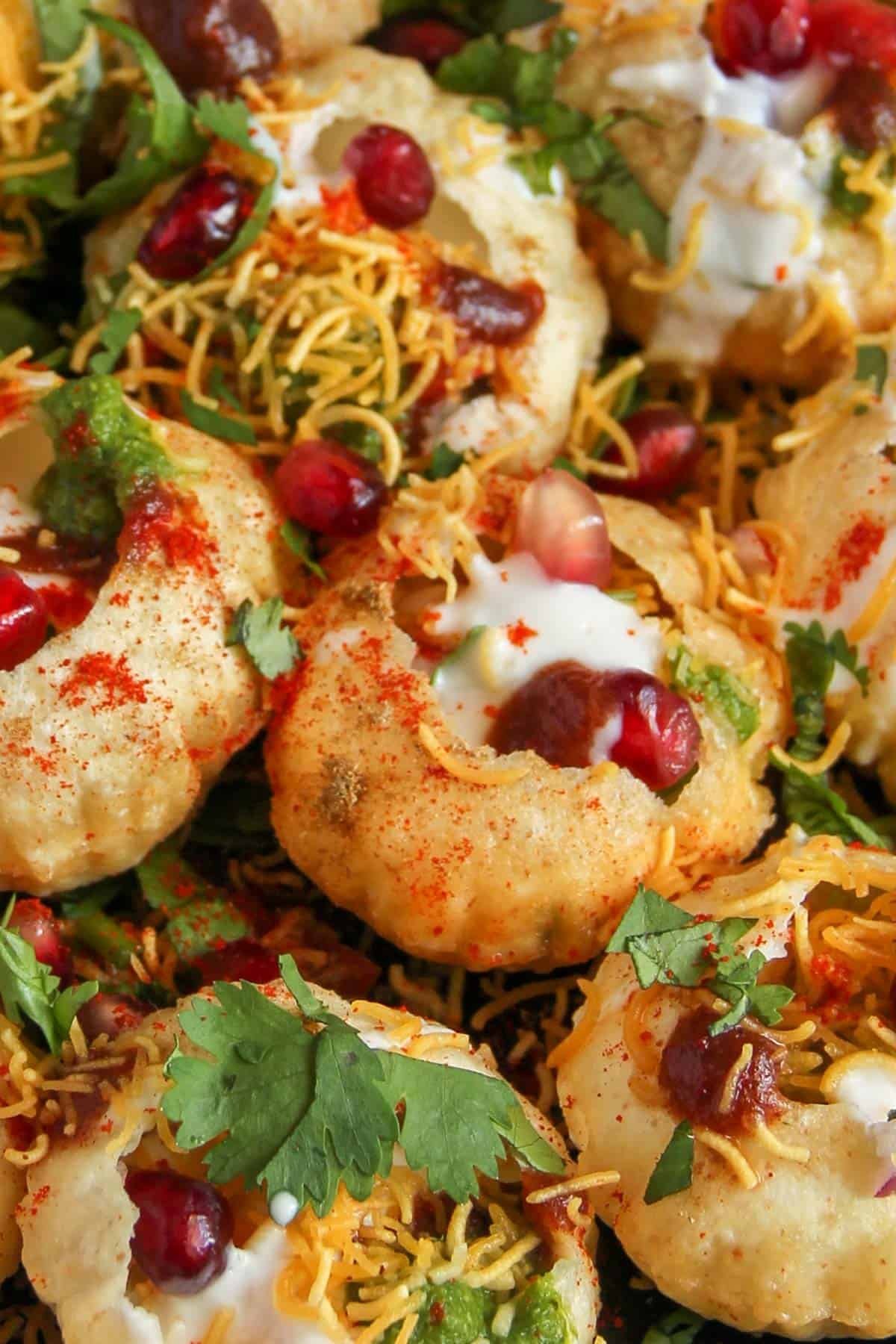 Dahi Sev Puri garnished with cilantro 