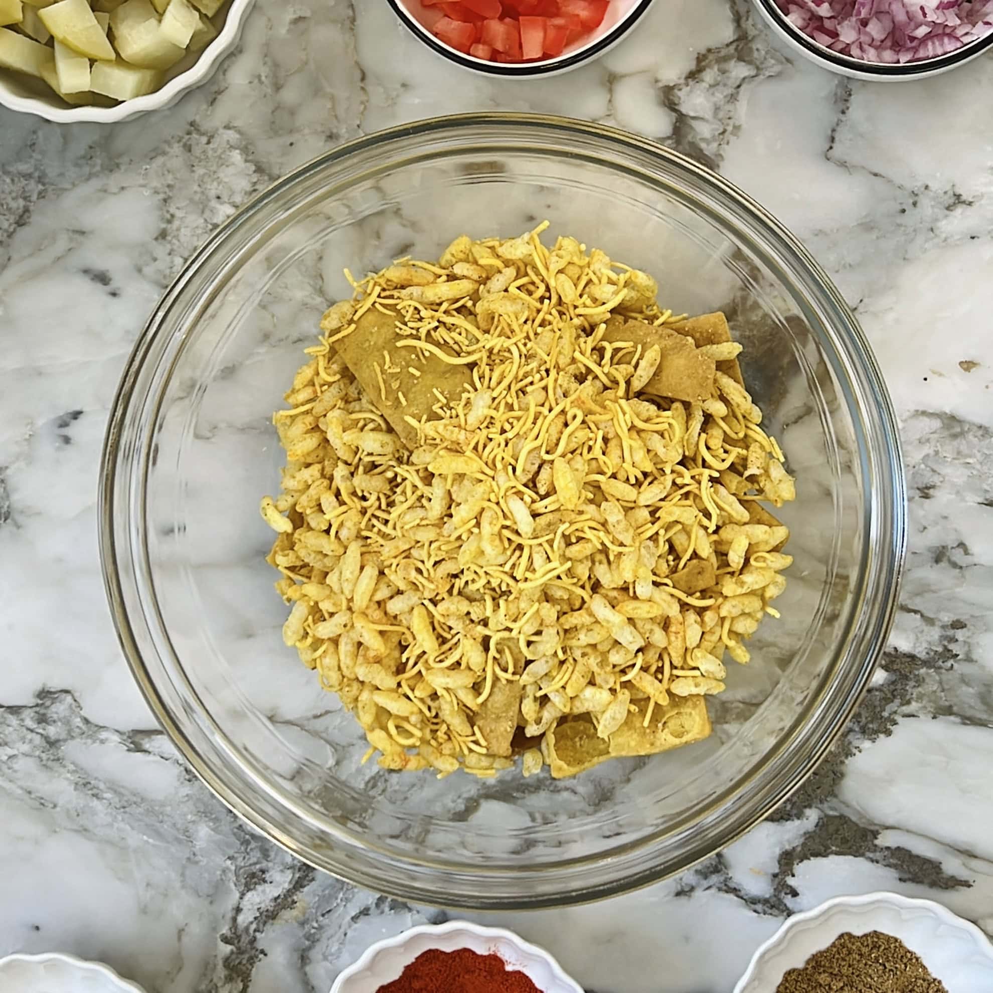 dry bhel in a mixing bowl 