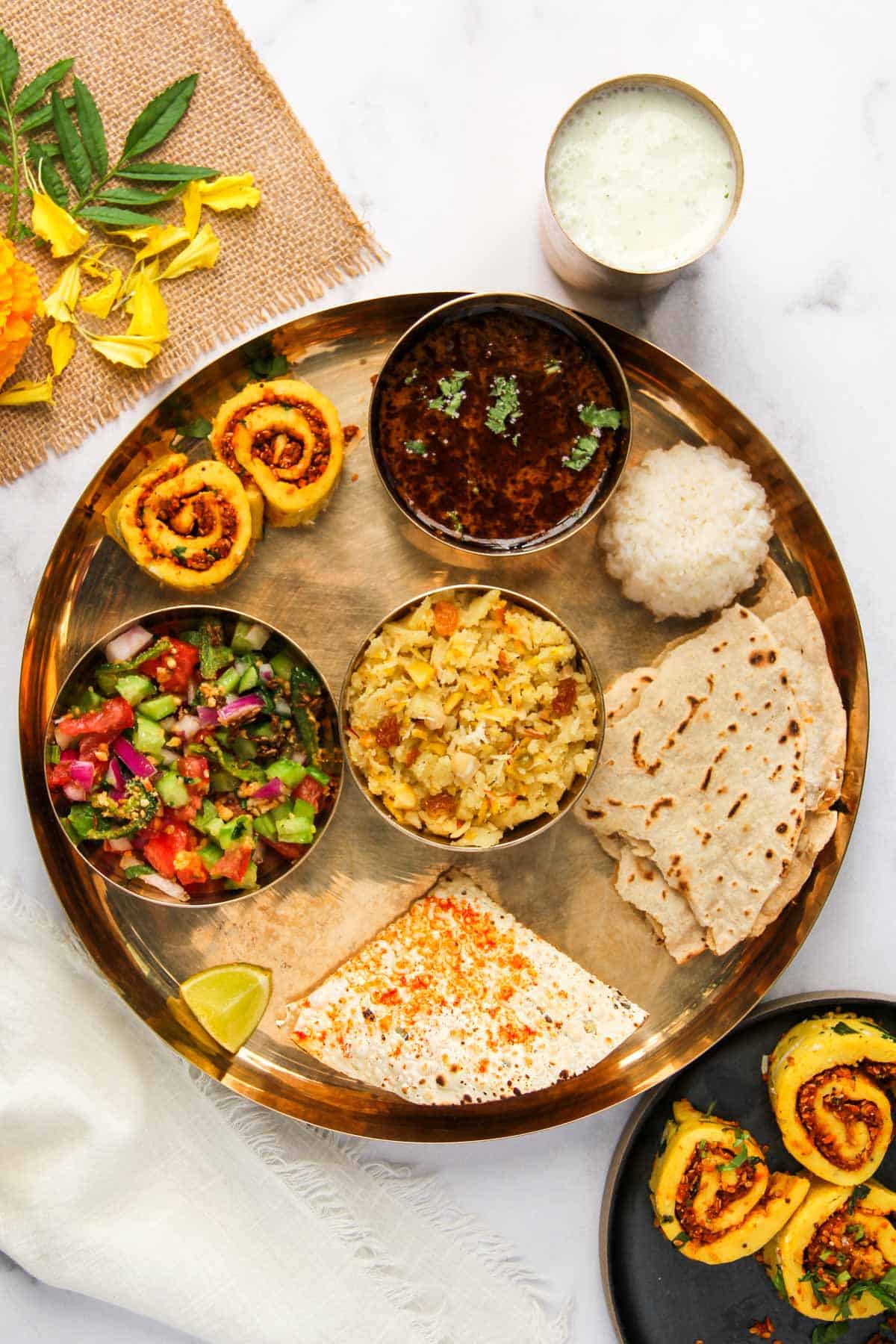 Thali with Maswadi, Bhakri and rice 