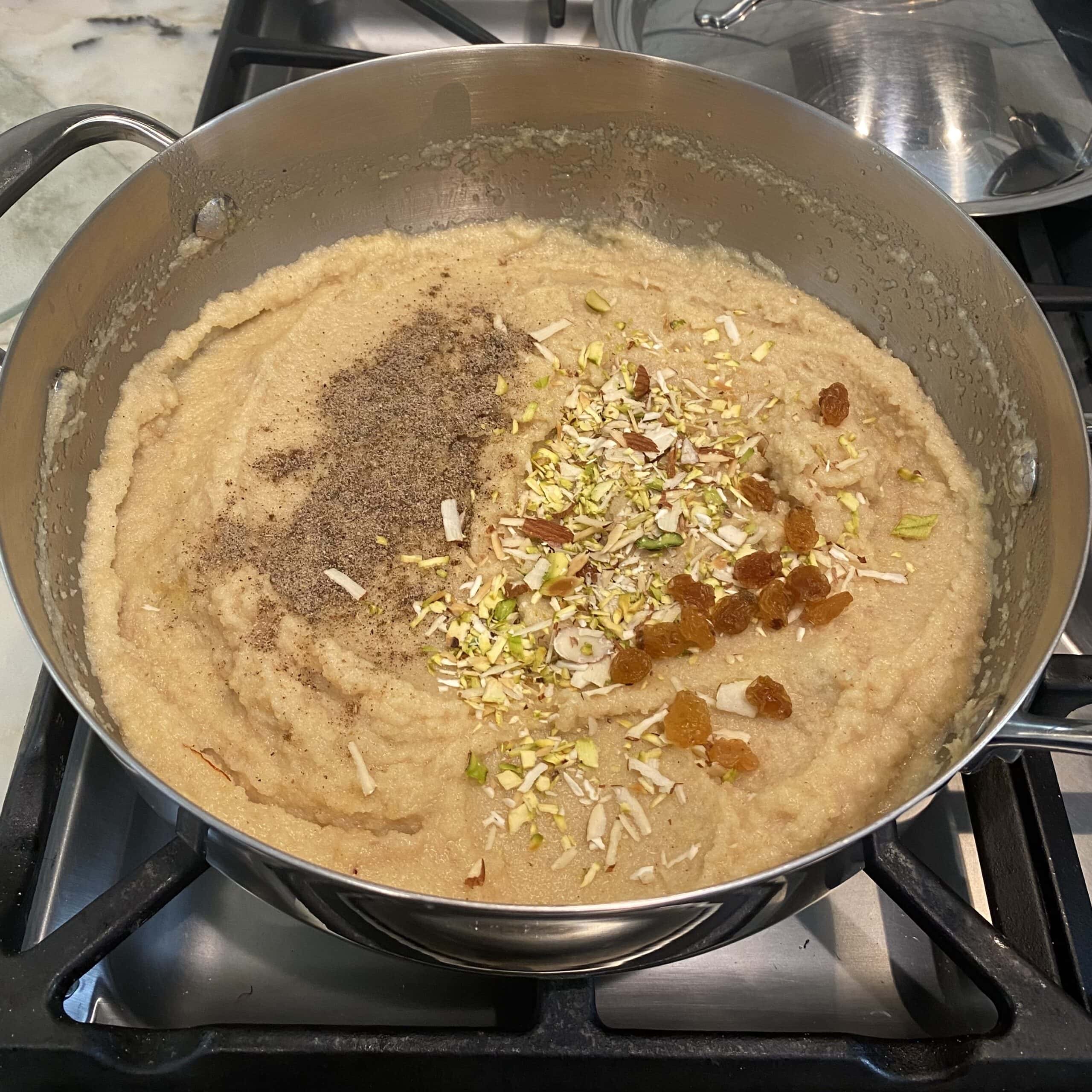 ground cardamom, chopped nuts and raisins added to sheera