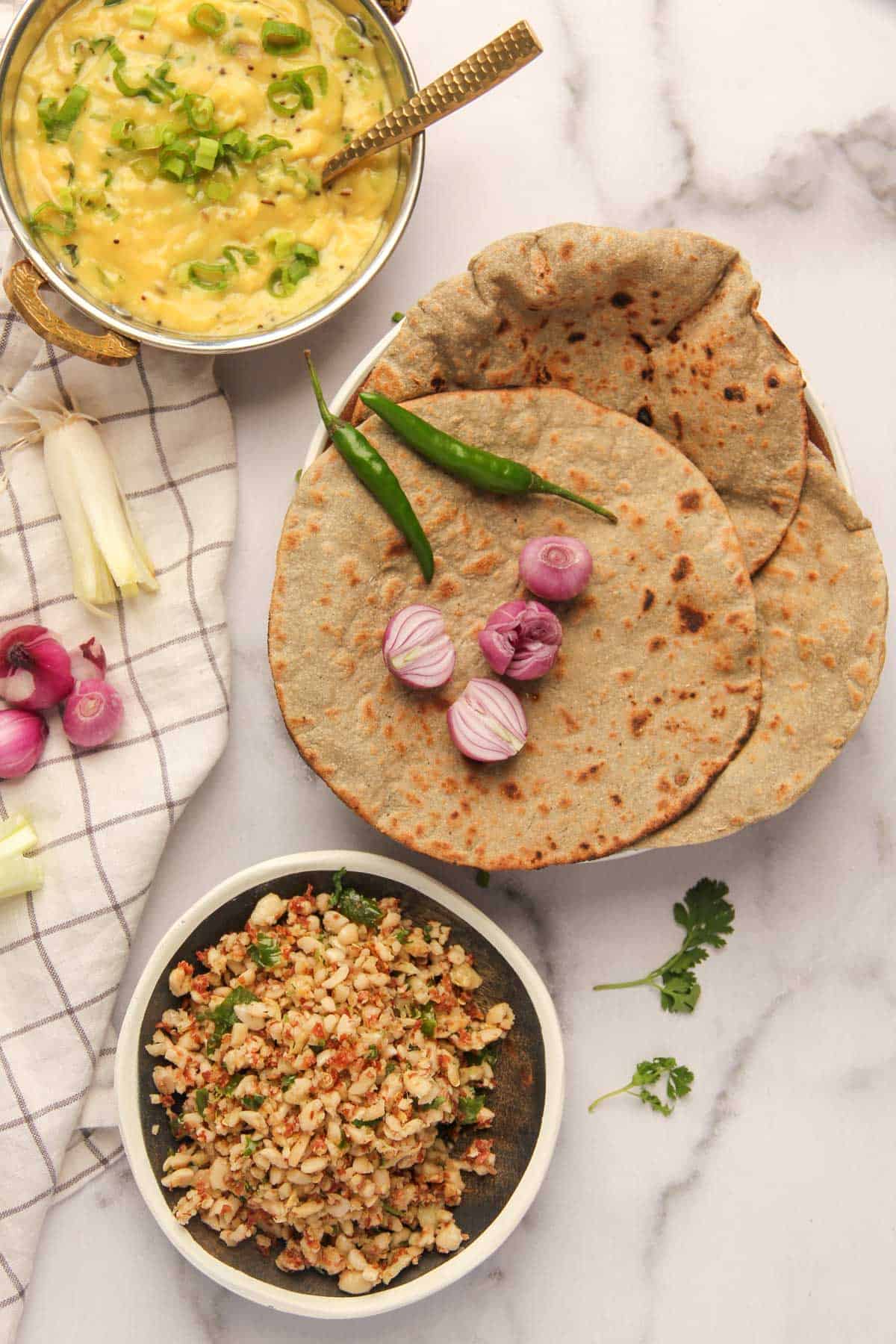 peanut Thecha served alongside Bhakri and Pithla 