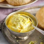 Shrikhand in a silver bowl