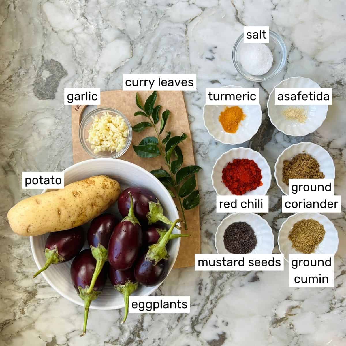 ingredients to make potato eggplant  curry 