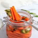 quick pickled carrots in a glass jar