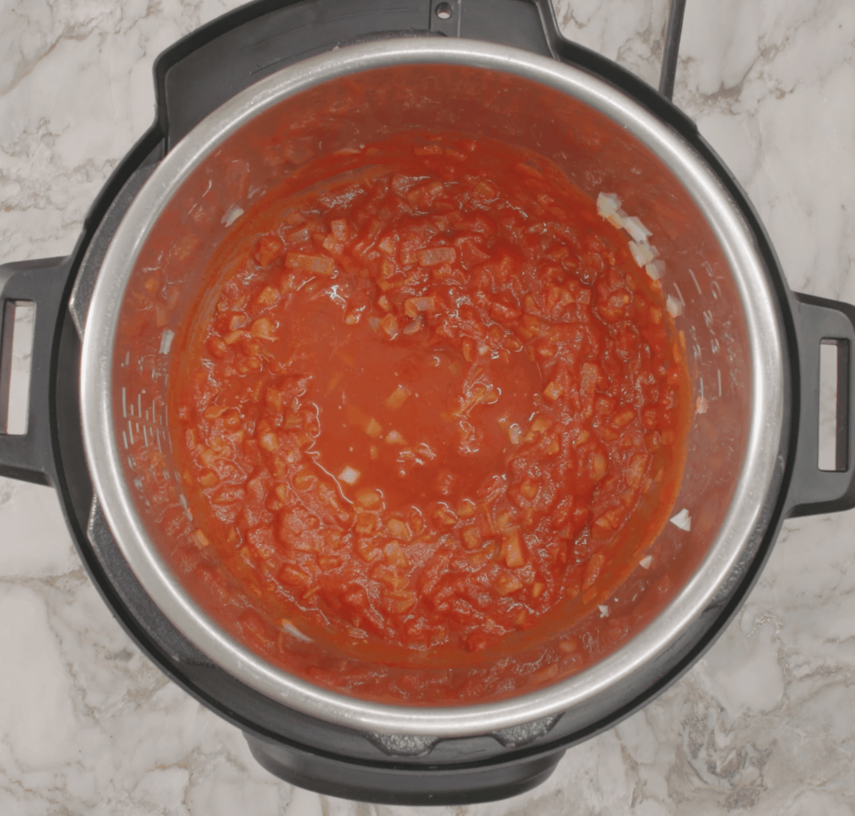 sauteed onions, tomatoes and spices in the Instant Pot