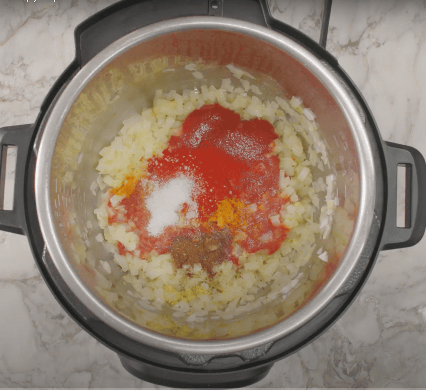 ground spices added to sauteed onions