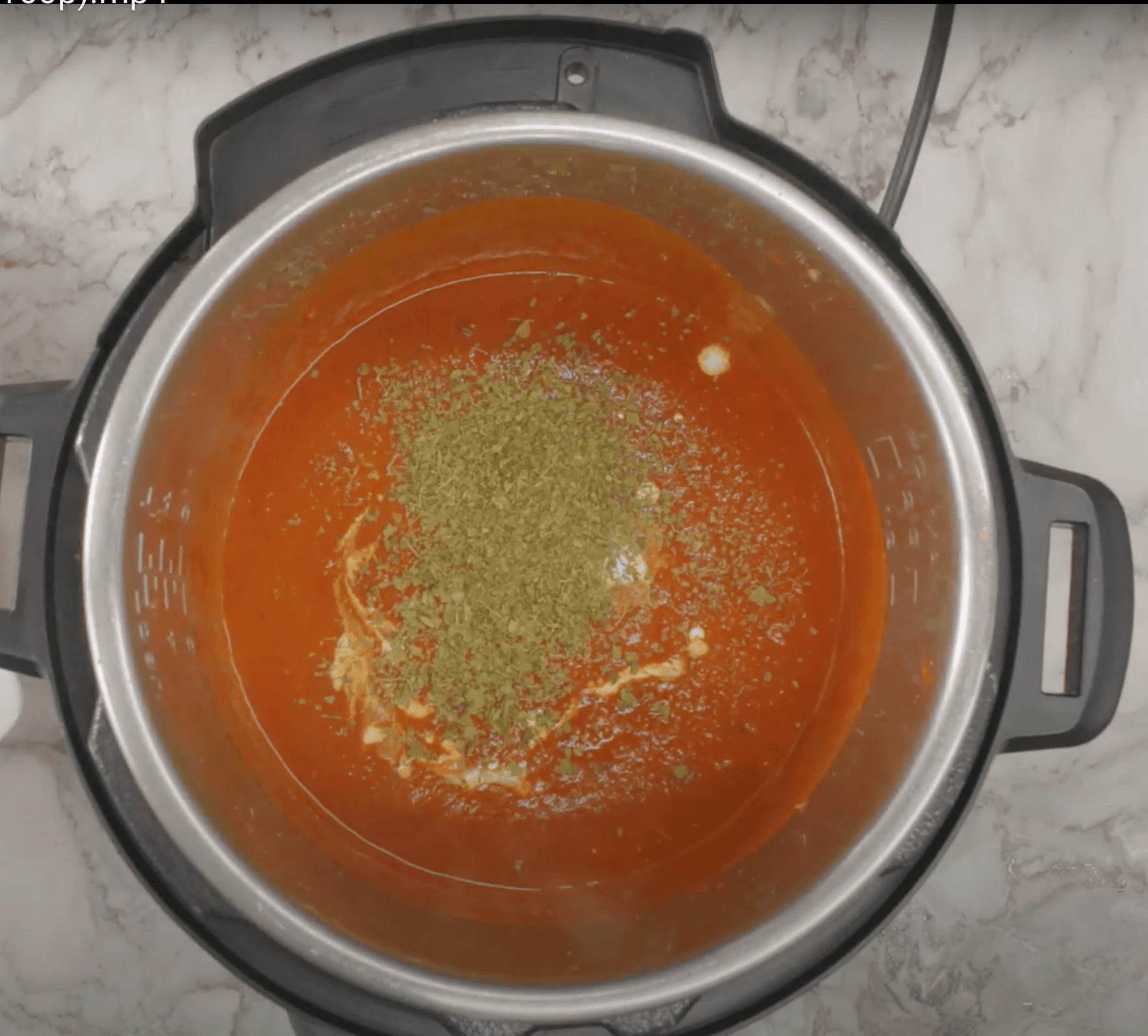 added cream and kasoori methi to the blended tikka masala sauce