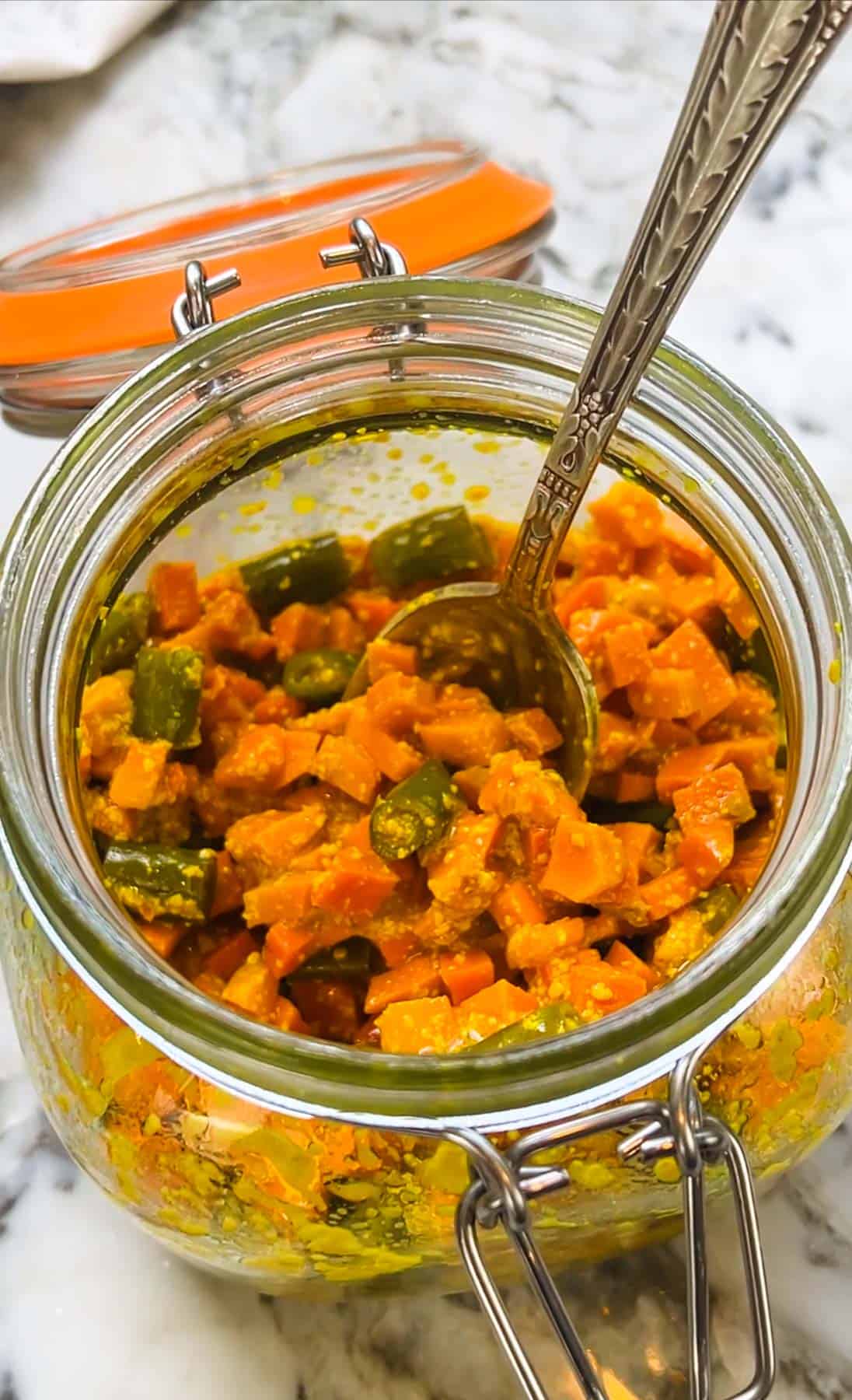 haldi achaar in a glass jar