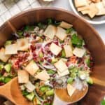 avocado chickpea chaat in a wooden serving bowl