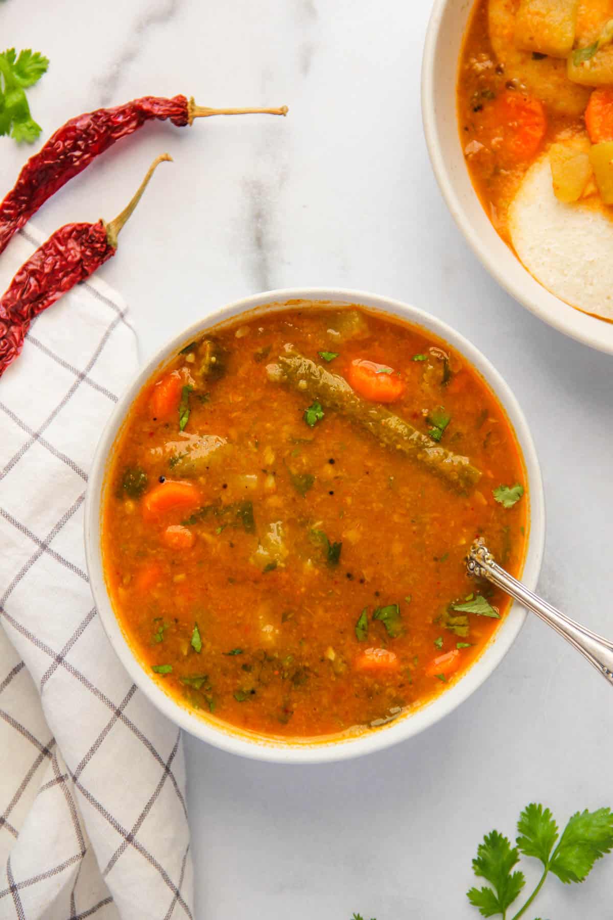 south Indian lentil stew served in a white bowl 
