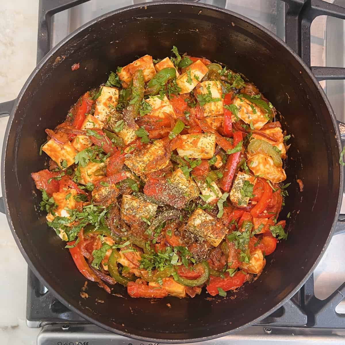 paneer jalfrezi garnished with Kasoori methi, and cilantro