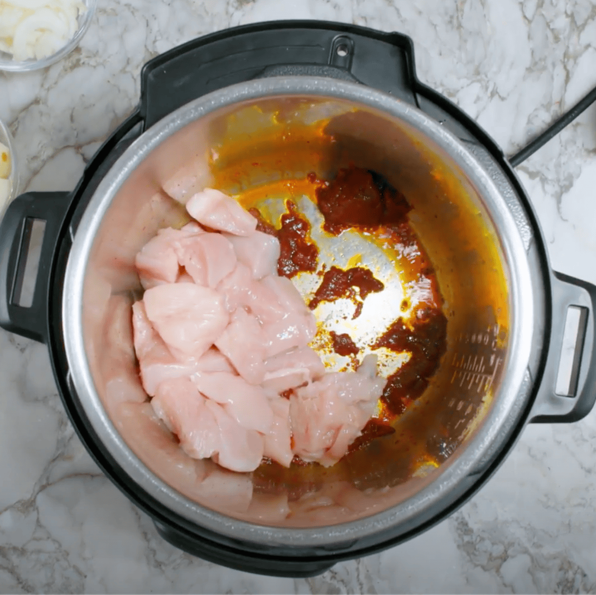 chicken added to masaaman curry paste 