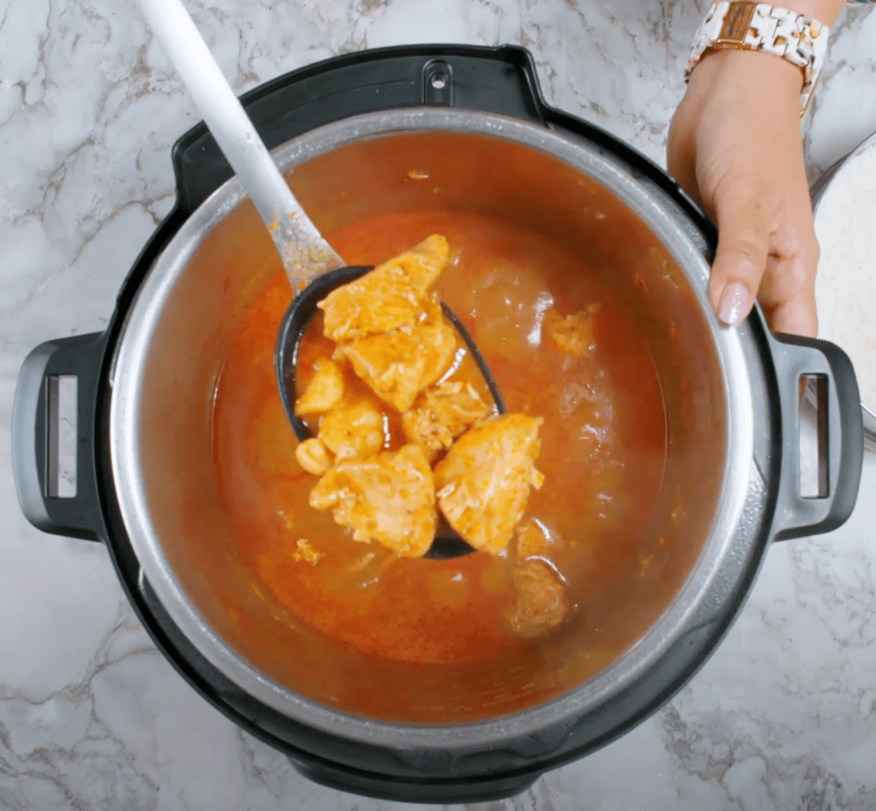 massman curry scooped out using a spatula.