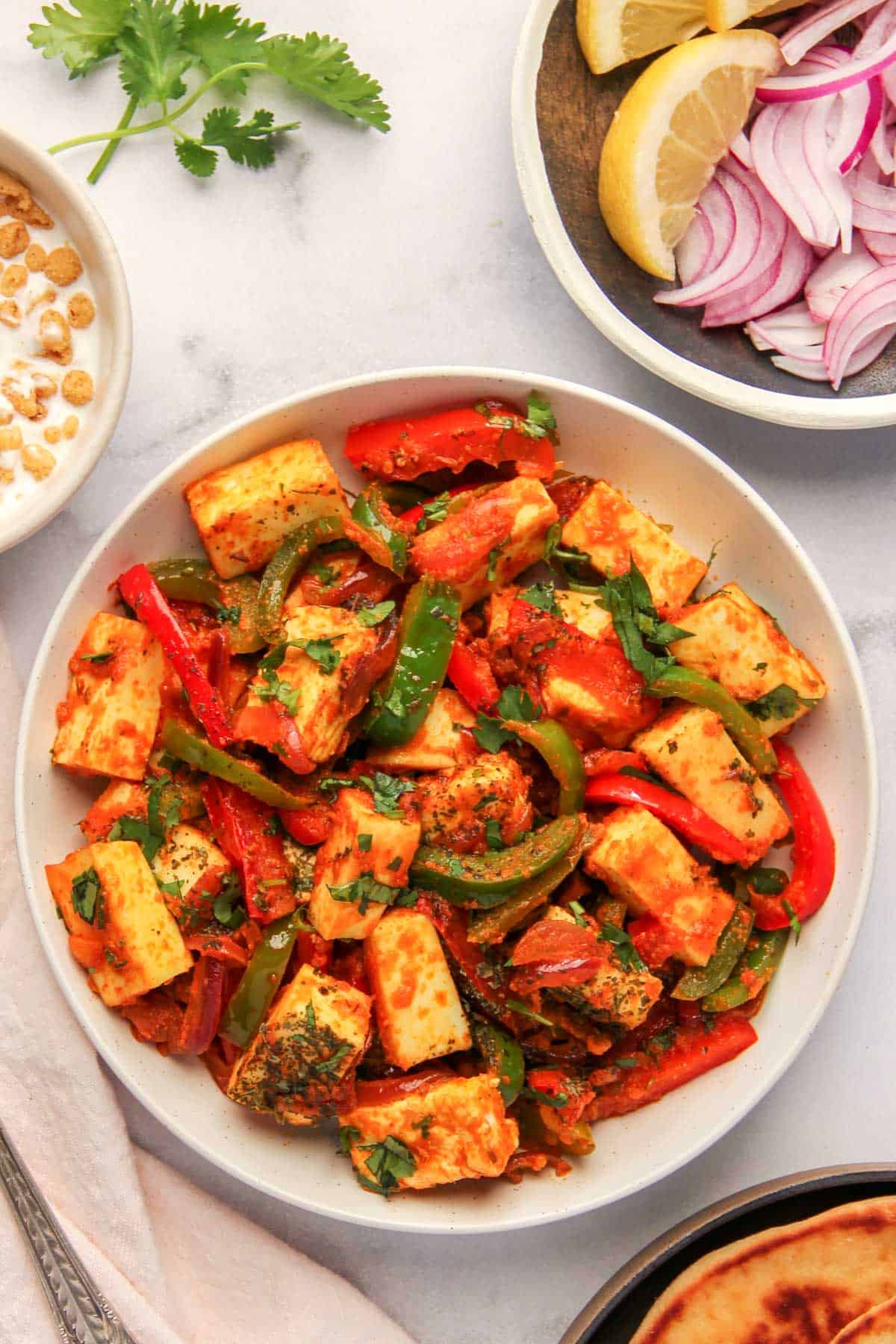 paneer jalfrezi in a white serving bowl 