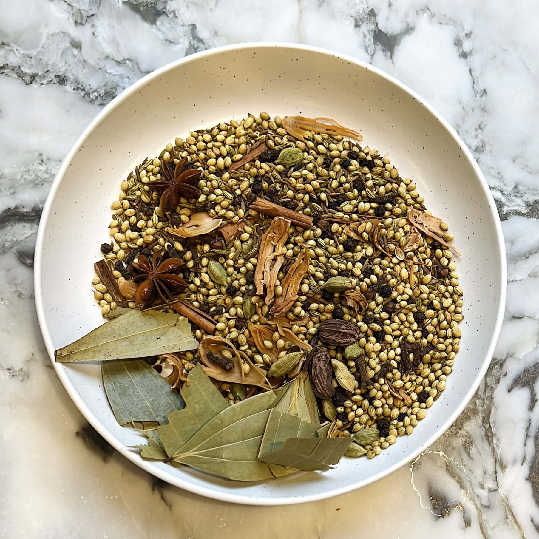 ropasted khada masala in a bowl