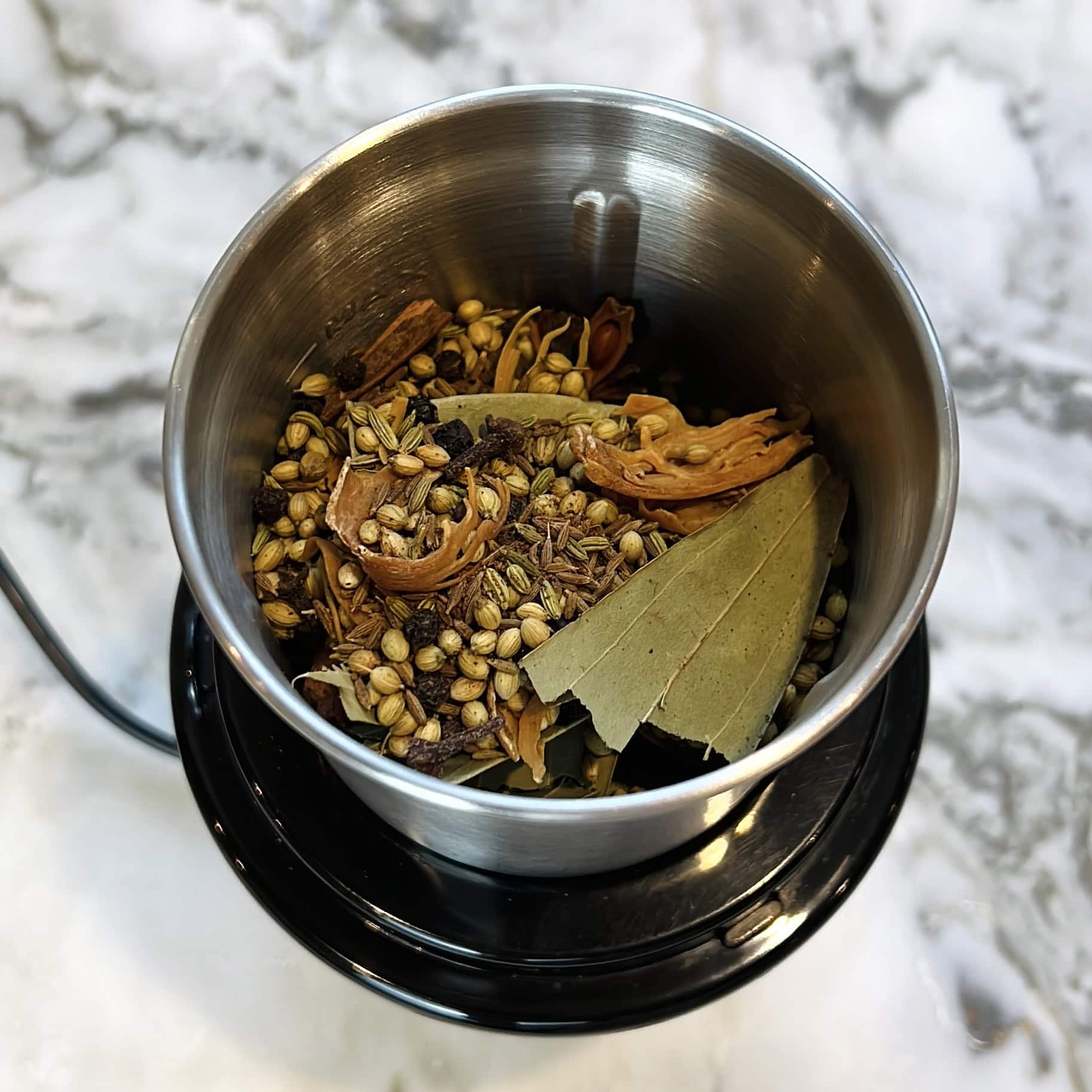 roasted spices in a mixie jar