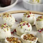 date and nut truffles dipped in white chocolate