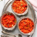 gajar ka halwa served in silver bowls