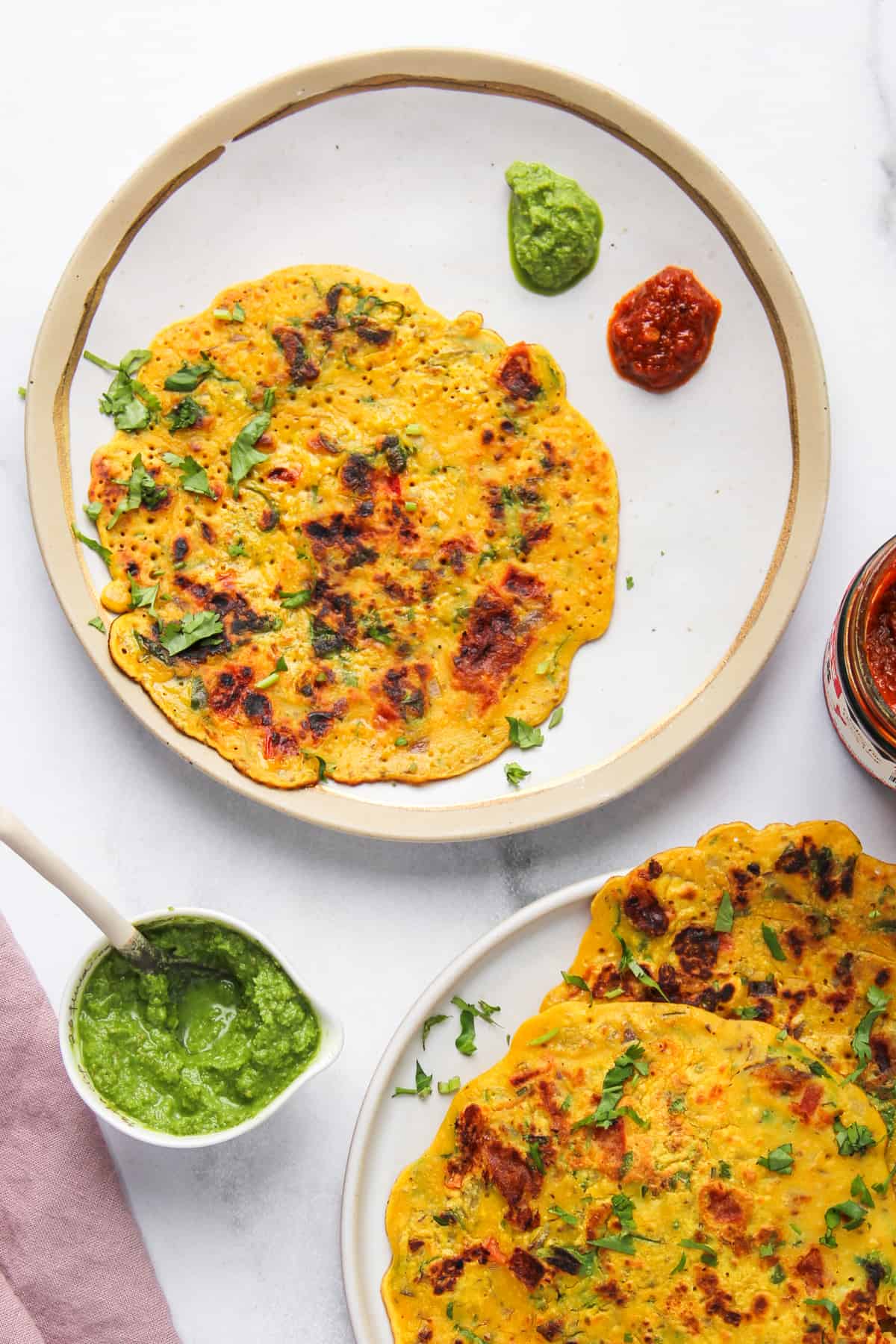 besan pudla served with green chutney. 