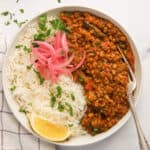 green moong dal served with rice and pickled onions