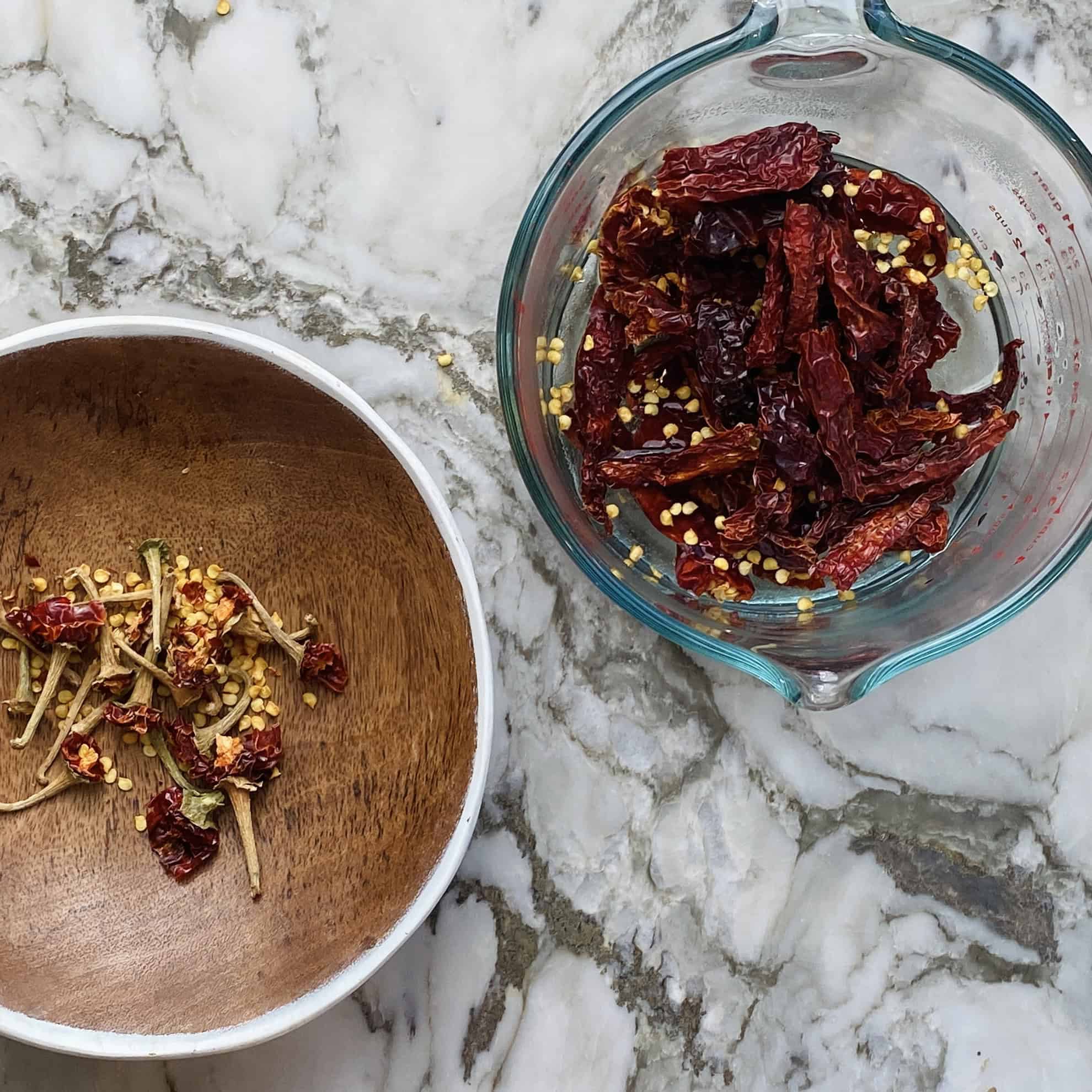 dried red chillies added to hot water
