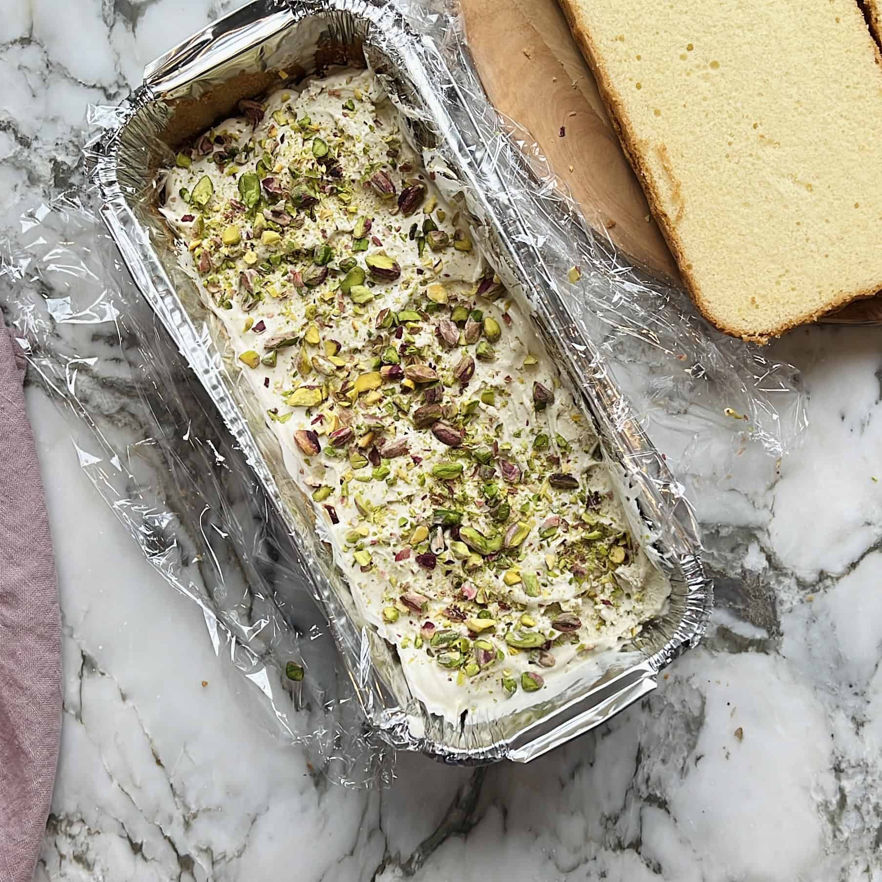 photos showing cake layered with ice cream and chopped pistachios