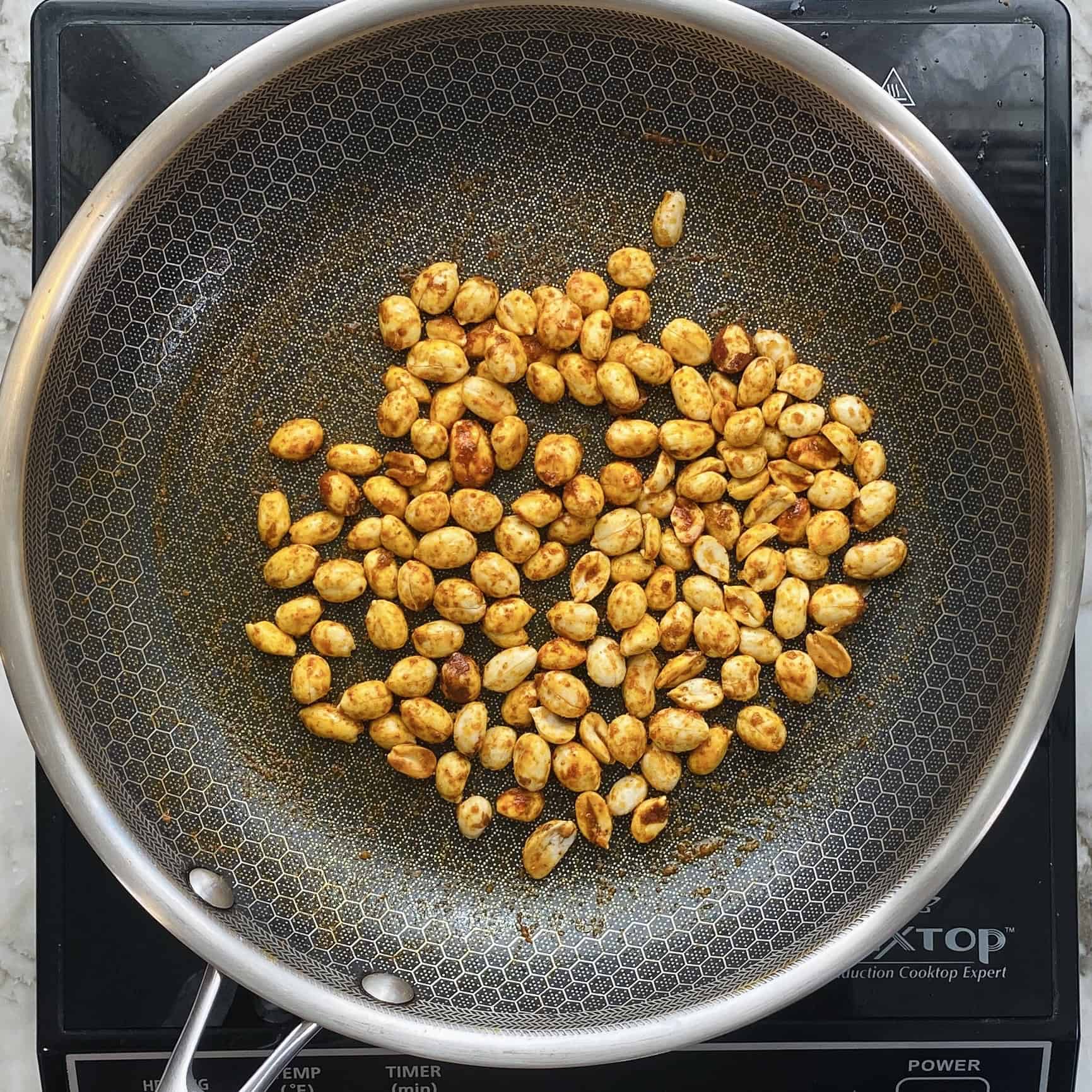 spicy peanuts in a pan. 