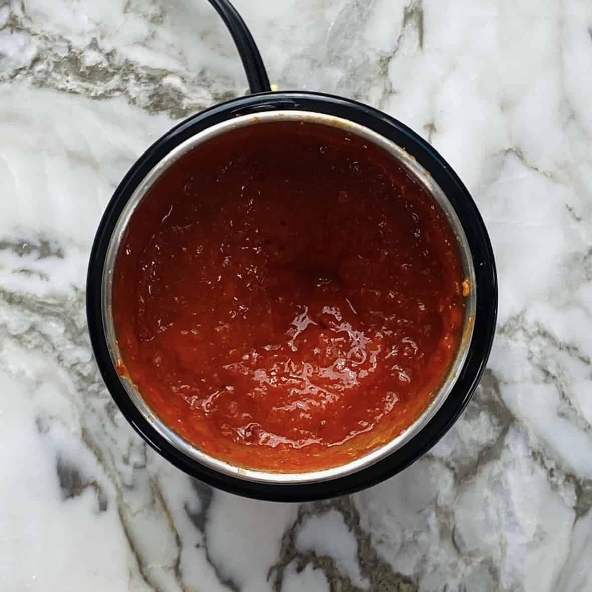 dabeli red chutney in mixer grinder jar. 