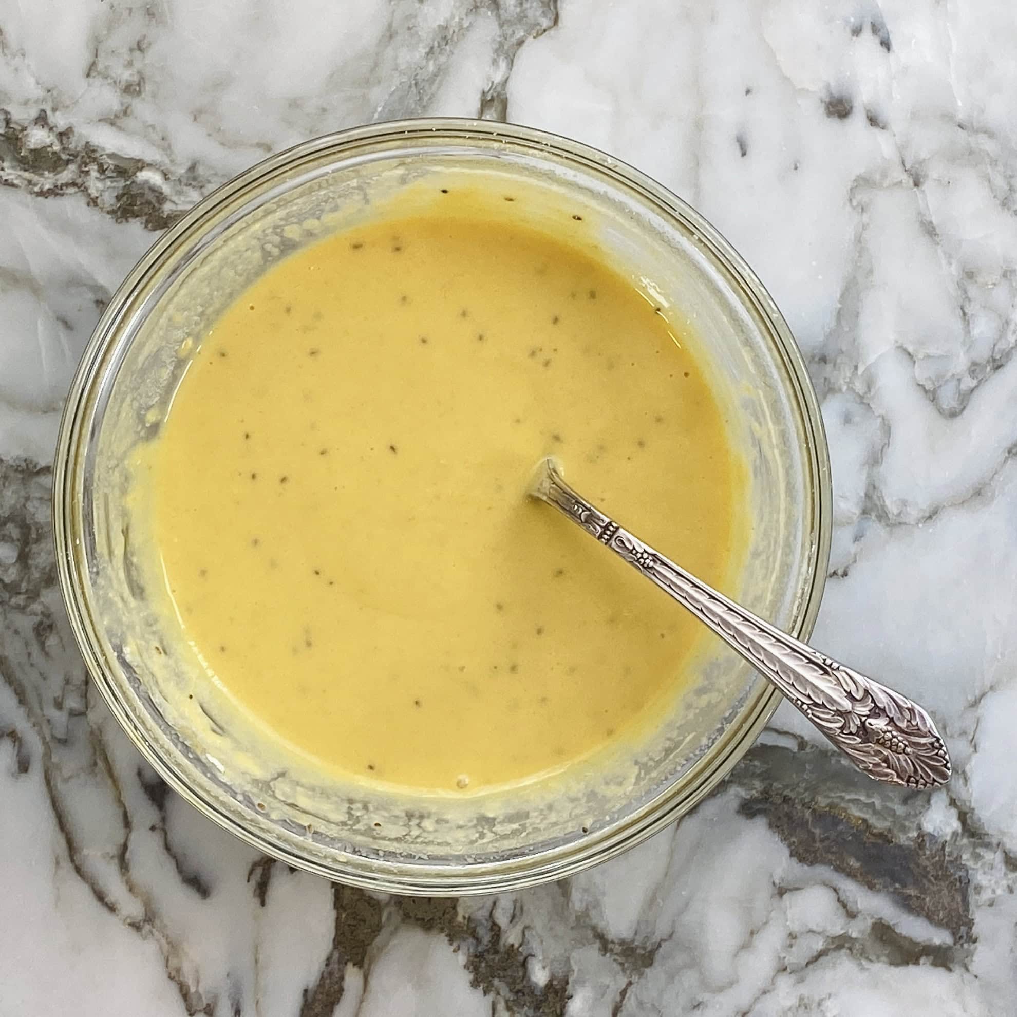 besan batter in a glass bowl 