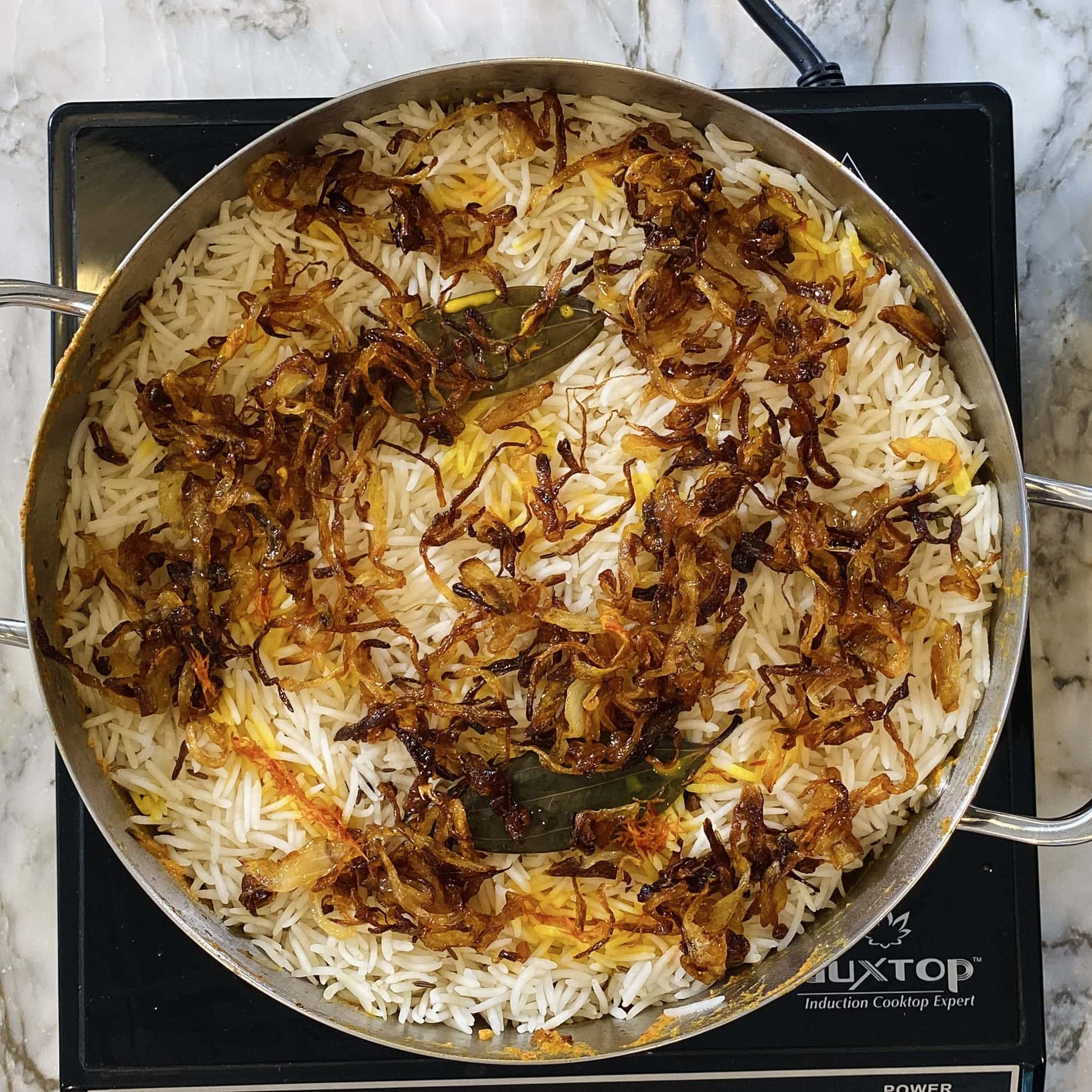 biryani rice with fried onions and saffron 