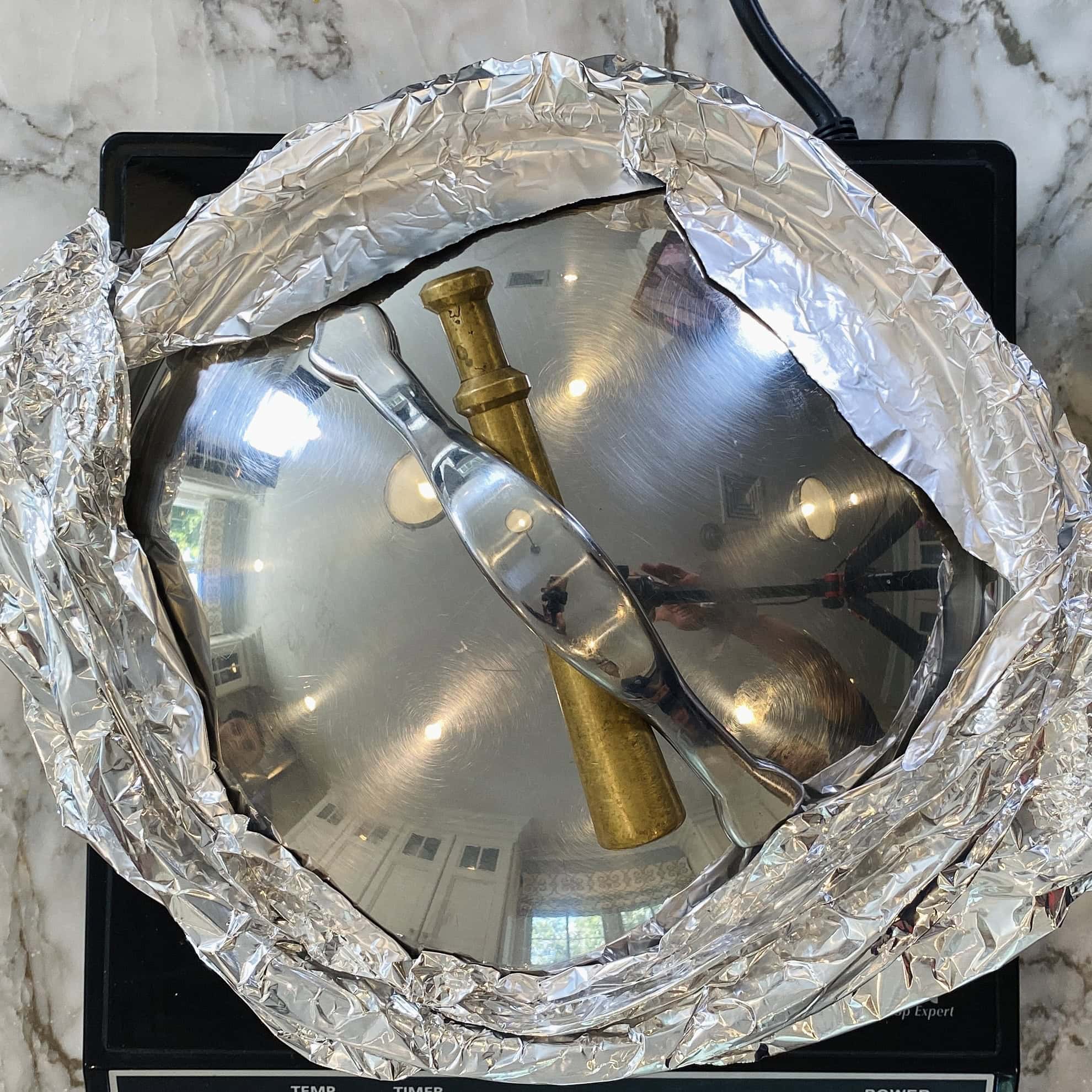 pot sealed with aluminum foil 