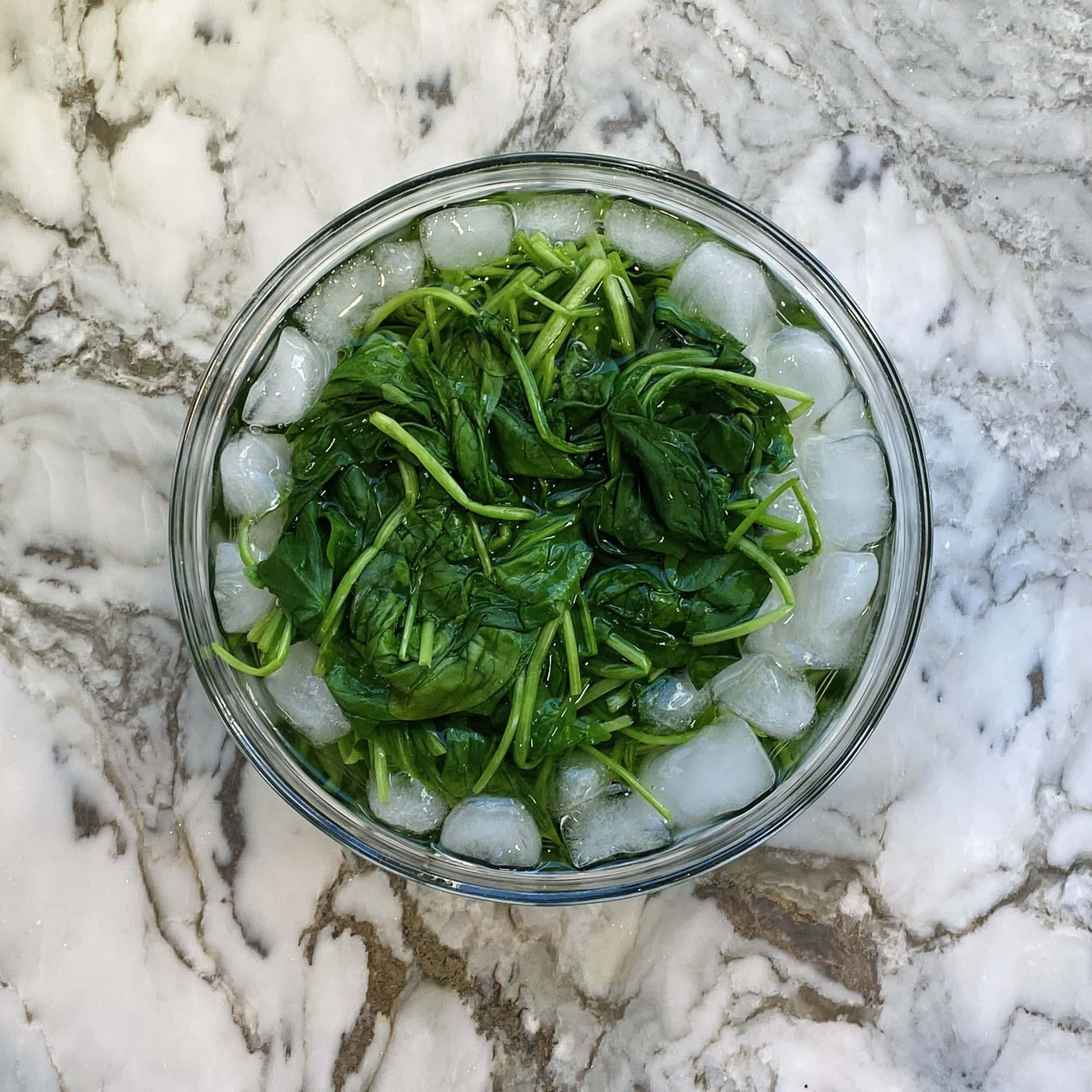 blanched spinach in ice bath 