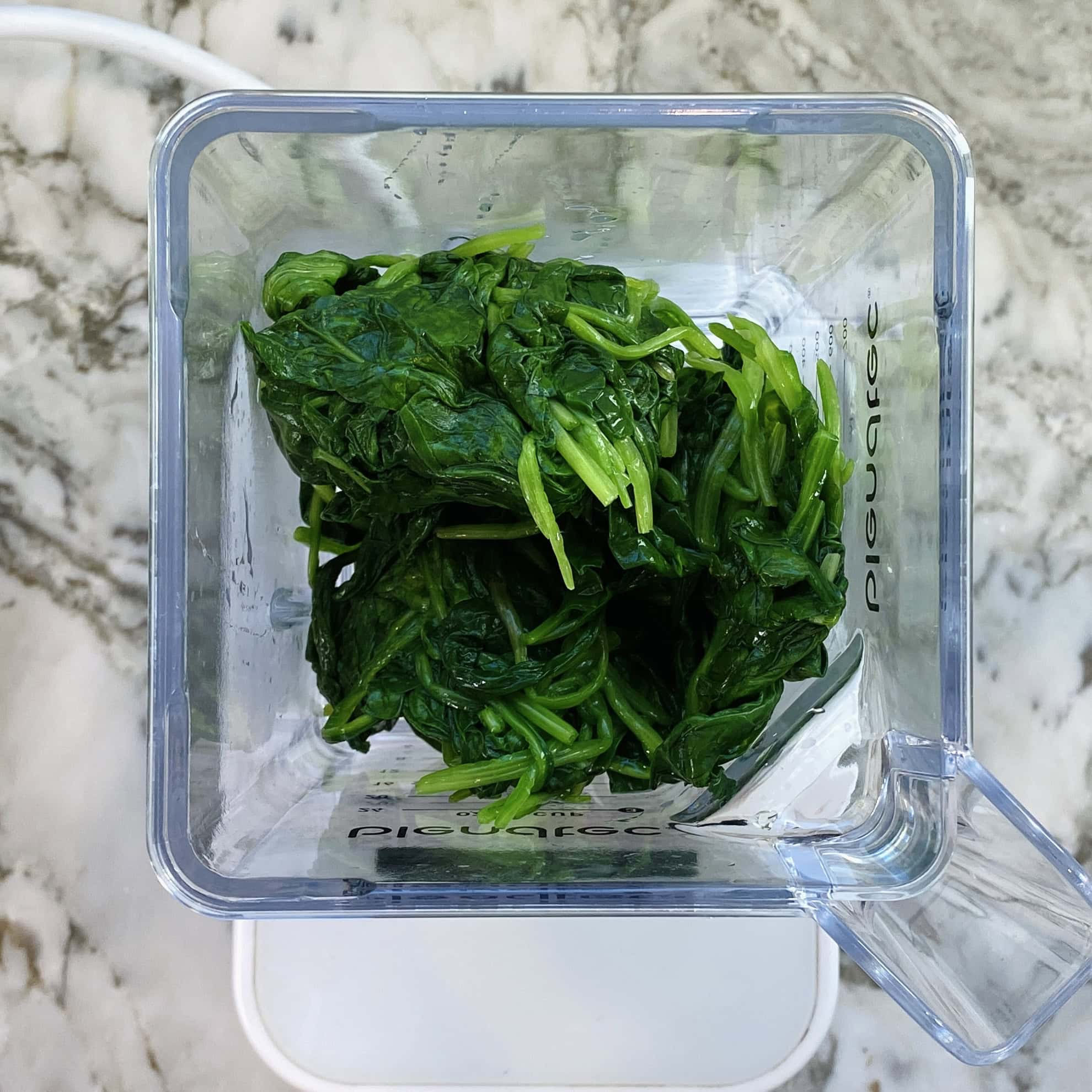 blanched spinach in a blender 