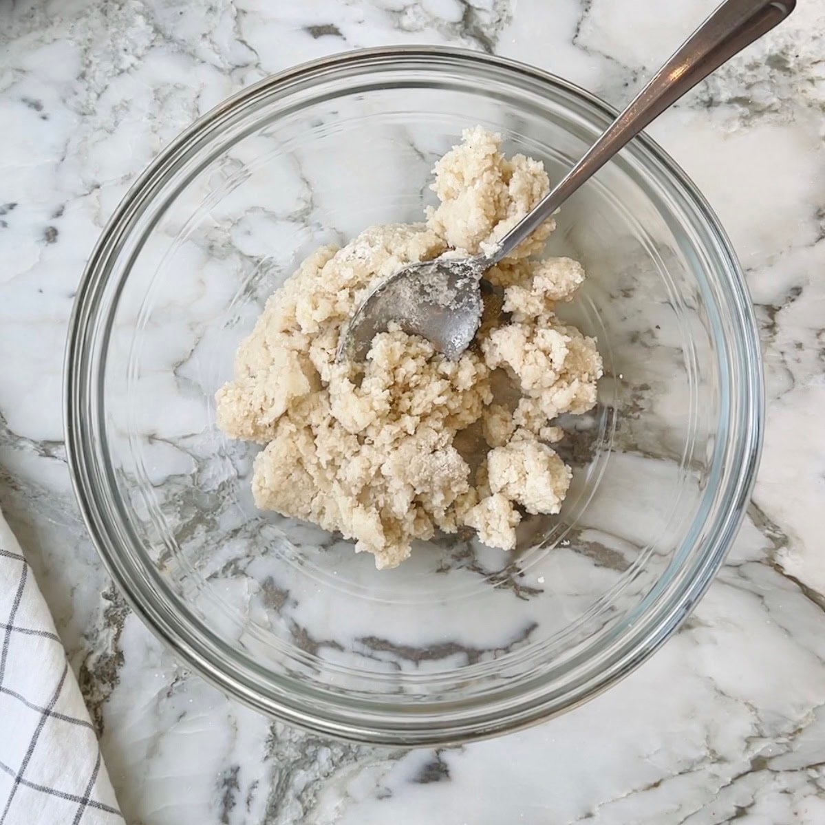 sorghum flour dough before kneading in a bowl