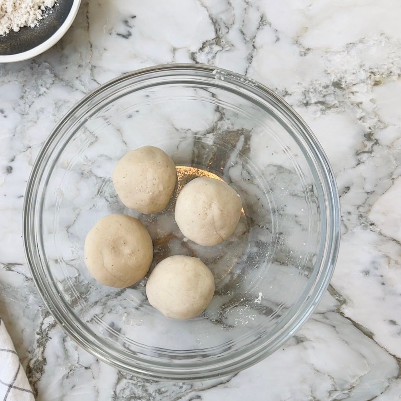 jowar flour dough balls in a mixing bowl