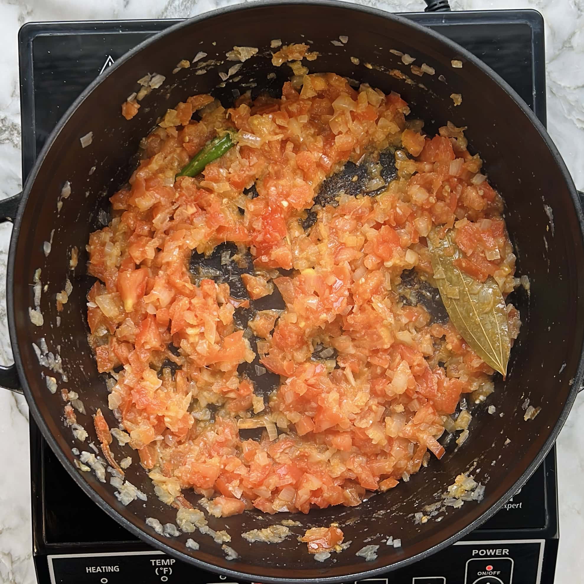 onion tomato masala in a pot 