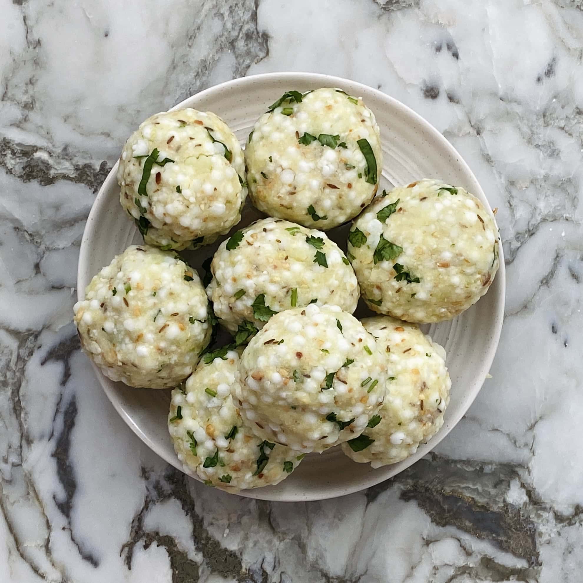 dough balls for sabudana thalipeeth in a platter